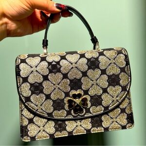 Kate Spade Odette top handle small jacquard monogram handbag twist lock